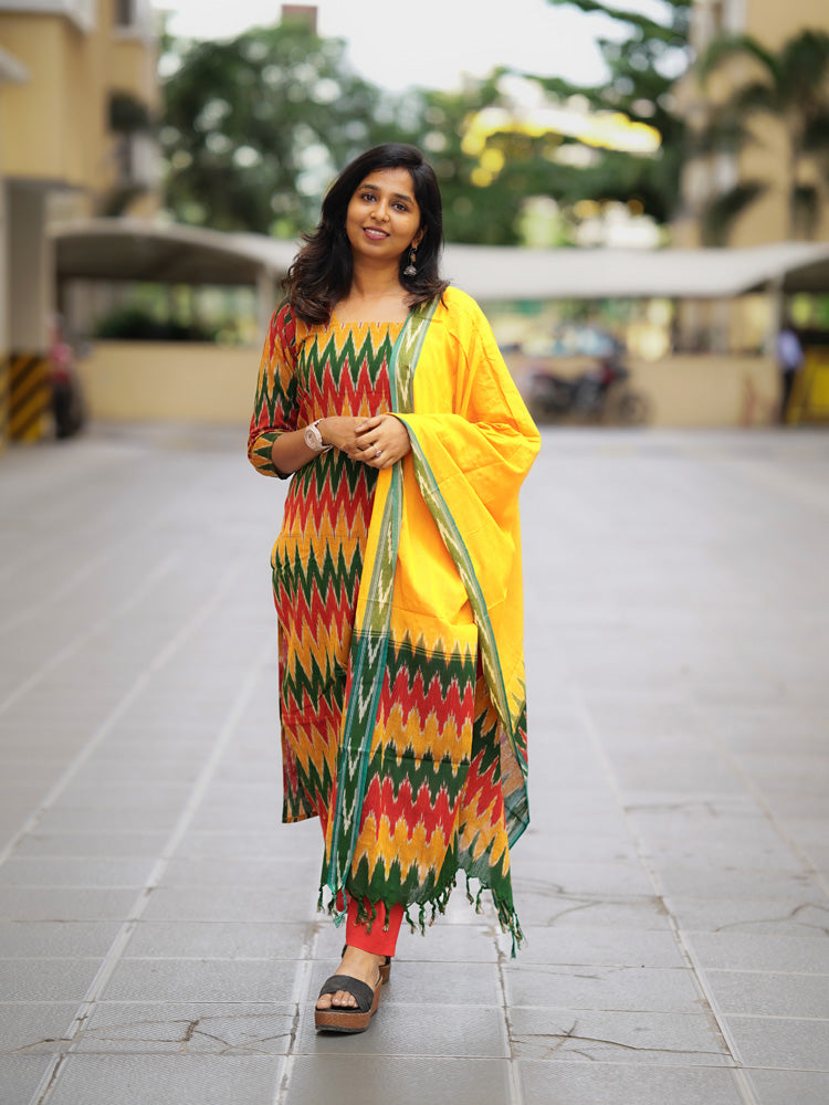 Ikkath suit is vibrant colors and geometric or traditional designs.