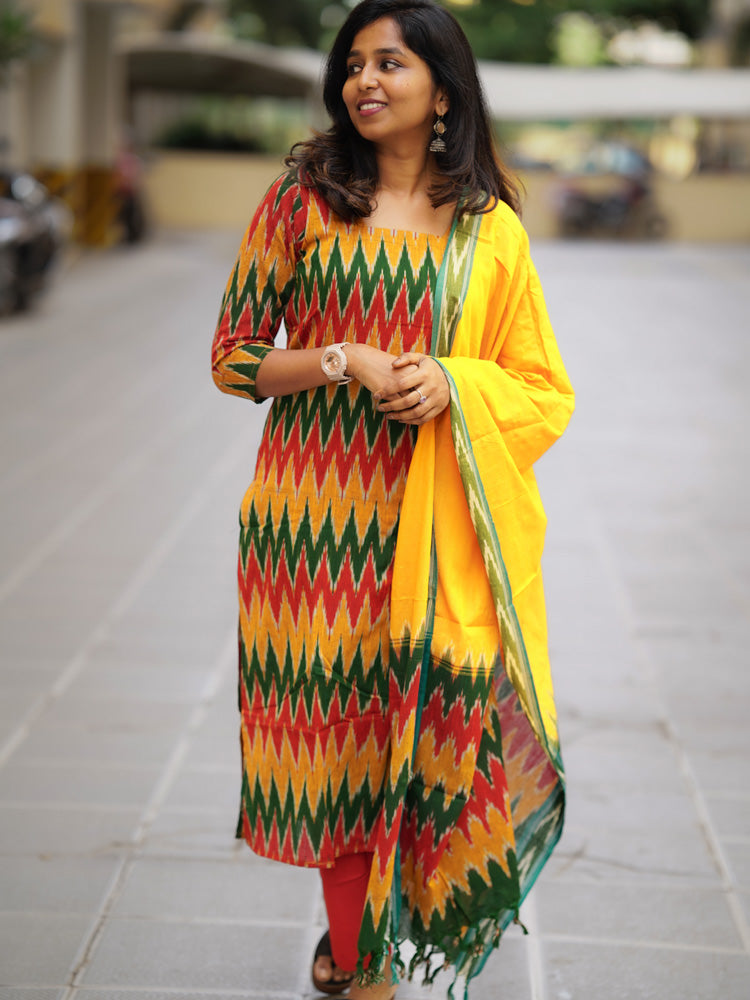 Ikkath suit is vibrant colors and geometric or traditional designs.