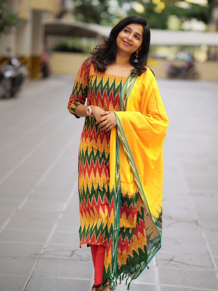 Ikkath suit is vibrant colors and geometric or traditional designs.