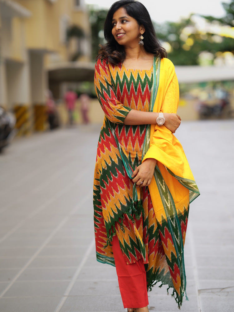 Ikkath suit is vibrant colors and geometric or traditional designs.