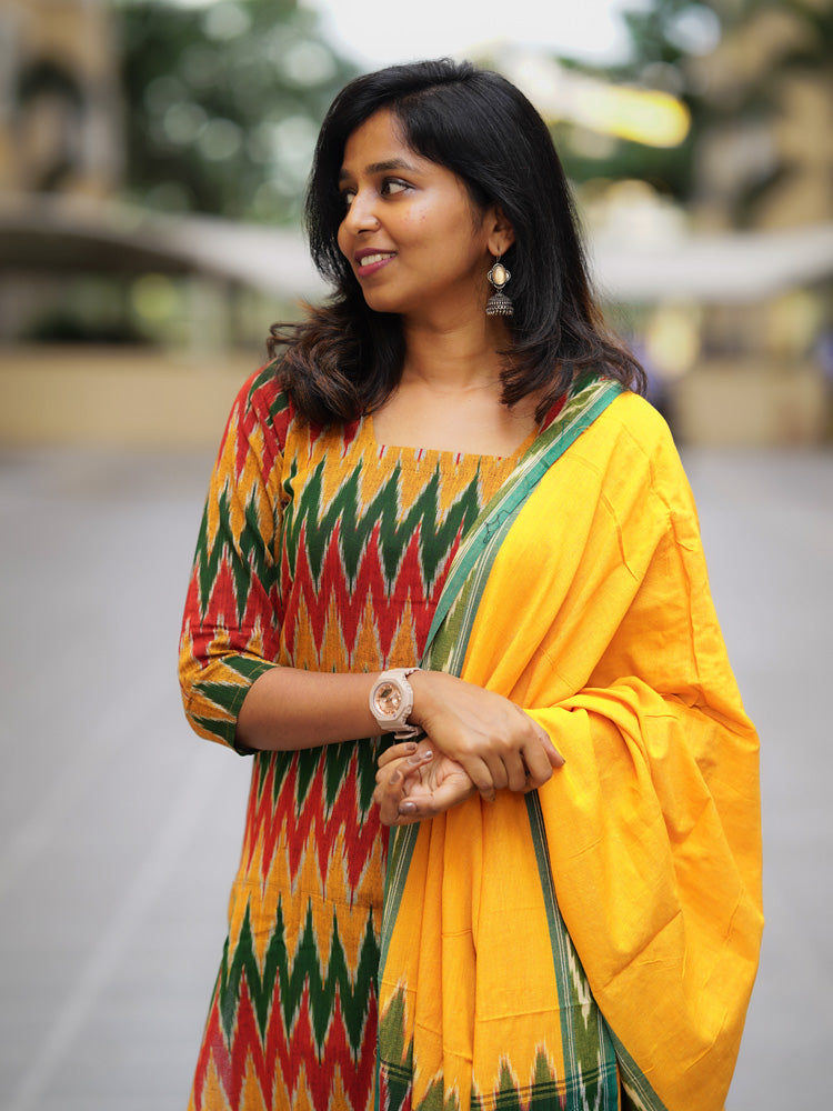 Ikkath suit is vibrant colors and geometric or traditional designs.